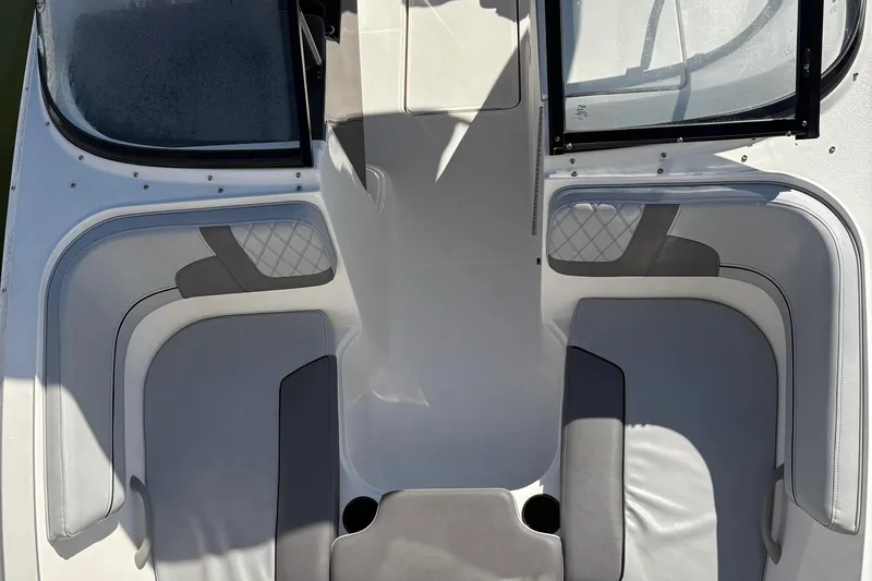 Slide: The Image of 2024 Bayliner VR6 Bowrider OB interior seating with modern design and comfortable upholstery. - 3