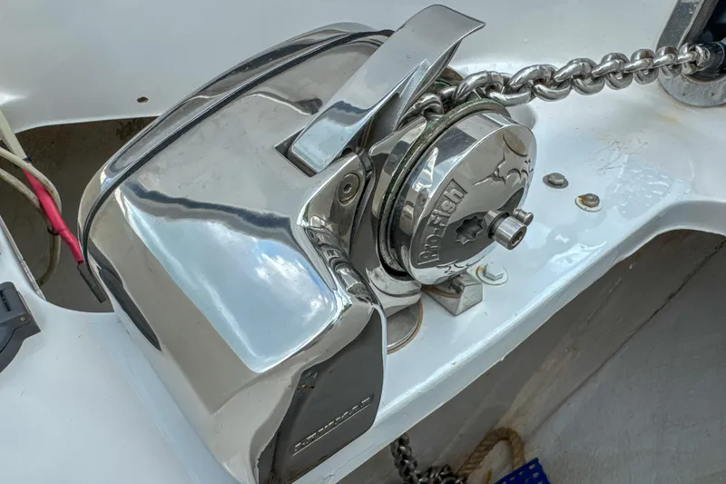 Slide: The Image of Chrome anchor windlass on 2009 Jupiter 39 Express boat deck. - 30