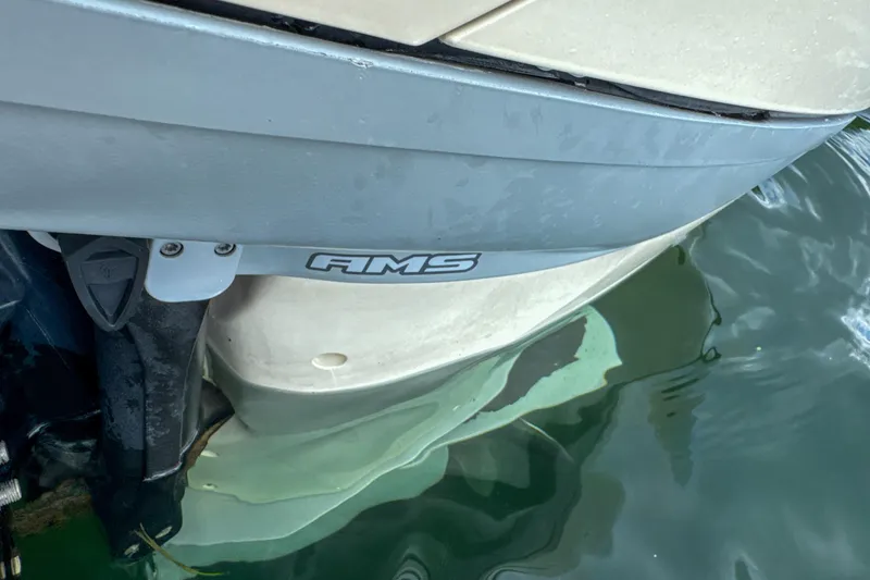 Slide: The Image of 2009 Jupiter 39 Express boat hull partially submerged in water. - 31