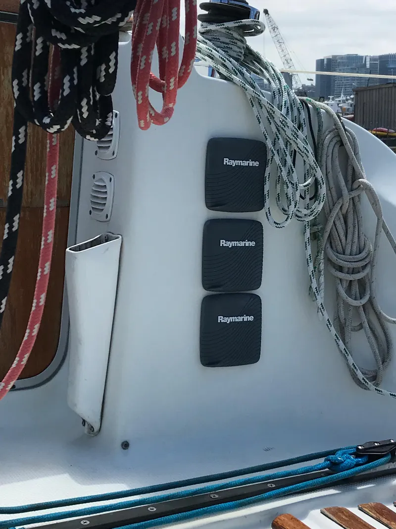 Slide: The Image of Beneteau First 310 sailboat cockpit with Raymarine equipment and ropes, 1993 model. - 16