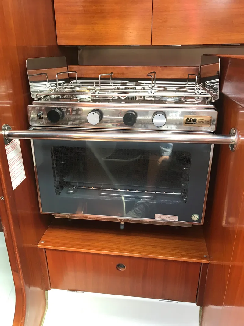 Slide: The Image of Stainless steel stove and oven in 1993 Beneteau First 310 yacht kitchen. - 42