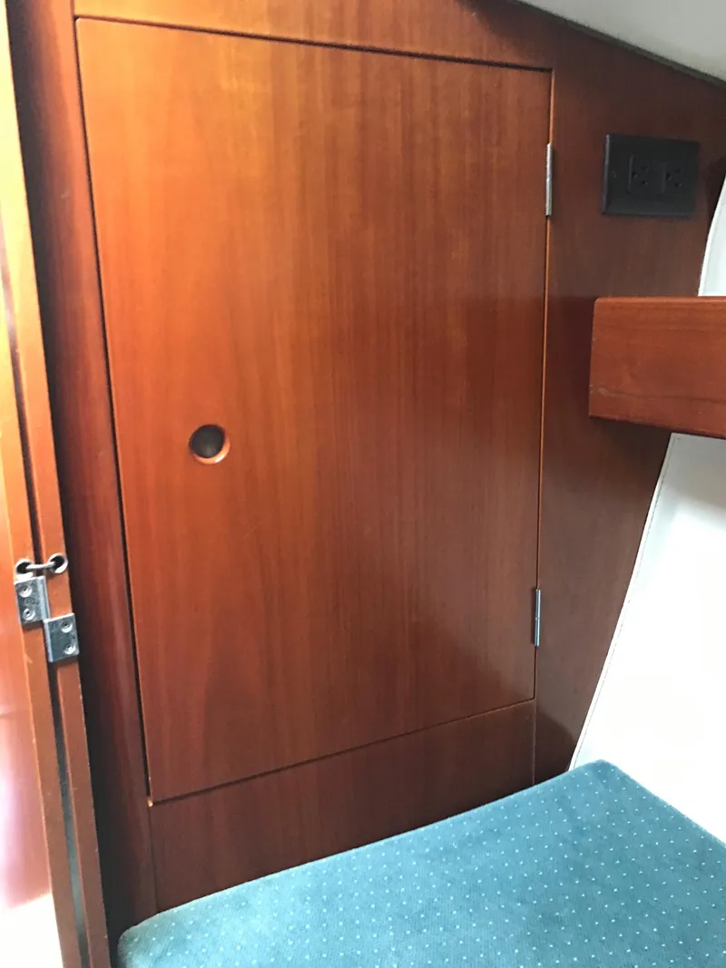 Slide: The Image of Wooden cabin interior of 1993 Beneteau First 310 sailboat. - 46