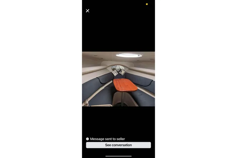 Slide: The Image of 2004 Four Winns 268 Vista cabin interior with seating and table. - 59