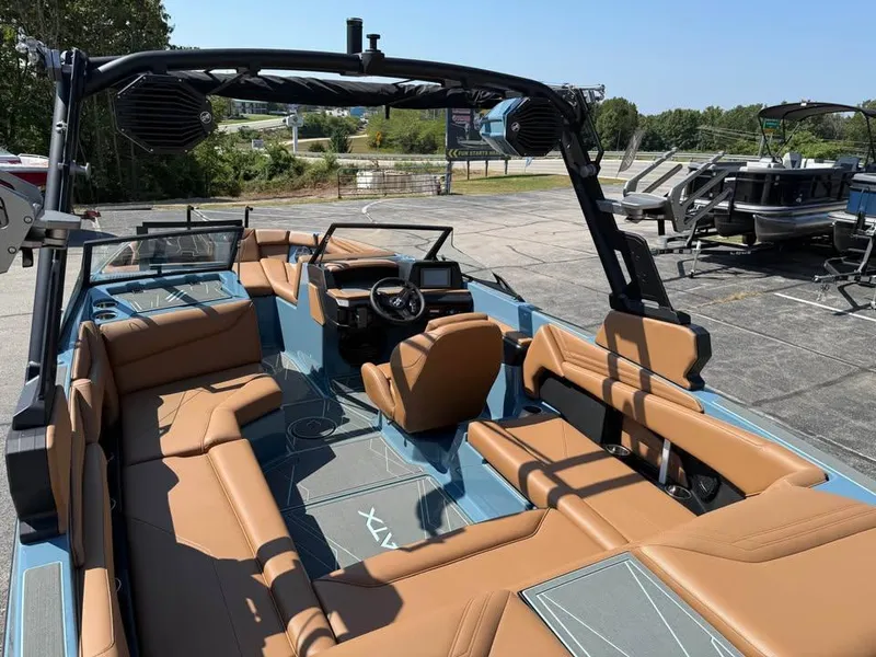 Slide: The Image of 2026 ATX Surf Boats 22 Type-S interior with tan seating and modern dashboard. - 8