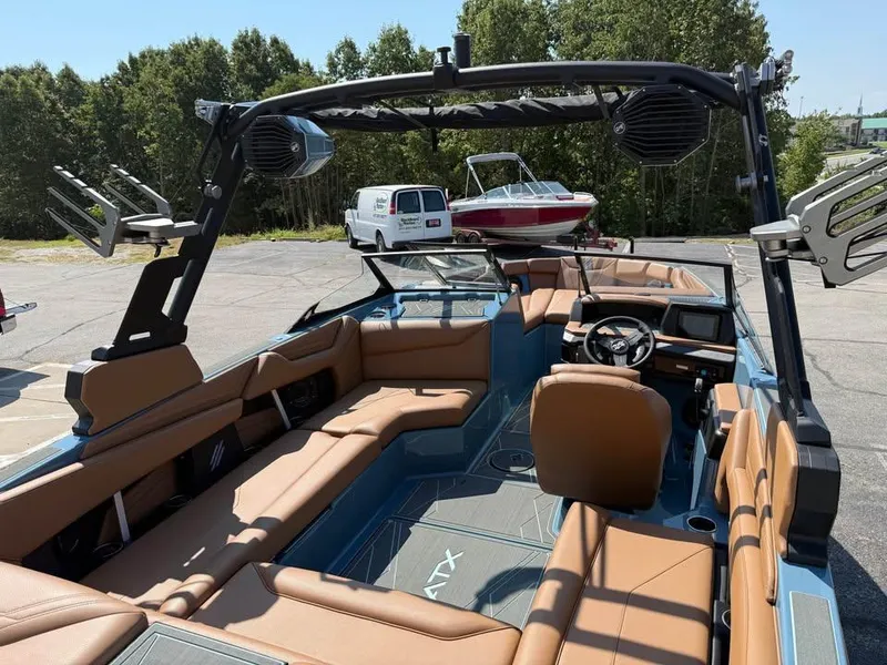 Slide: The Image of 2026 ATX Surf Boats 22 Type-S interior with tan seating and modern dashboard. - 9