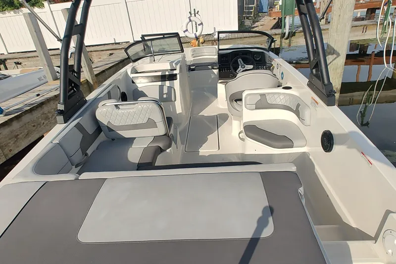 Slide: The Image of 2023 Bayliner VR6 Bowrider OB interior, featuring spacious seating and modern design. - 6