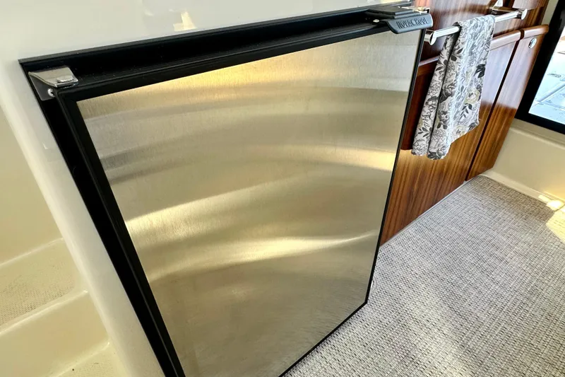 Slide: The Image of Stainless steel refrigerator in 2026 Ranger Tugs R-25 boat interior. - 23