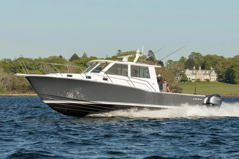 The Image of 2026 NorthCoast 415 HT boat docked at marina under clear blue sky. - 0