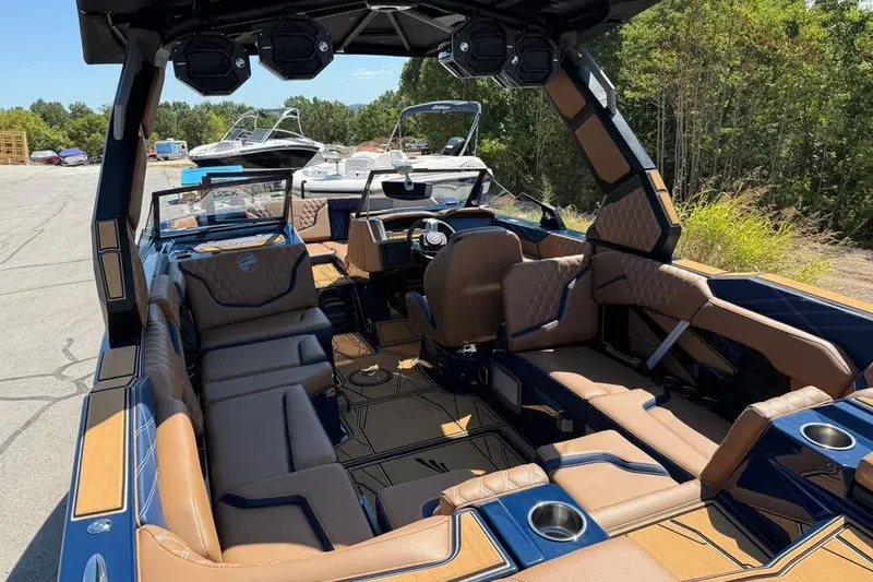 Slide: The Image of 2026 Tigé 24RZX boat interior with luxurious seating and modern design. - 8