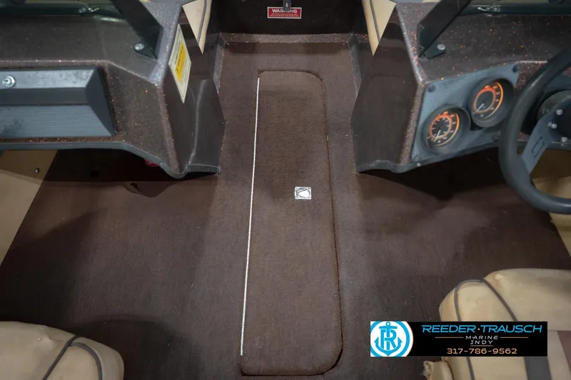 Slide: The Image of 1986 ProCraft 1775 Bass boat interior with dashboard and steering wheel, Reeder Trausch Marine. - 28