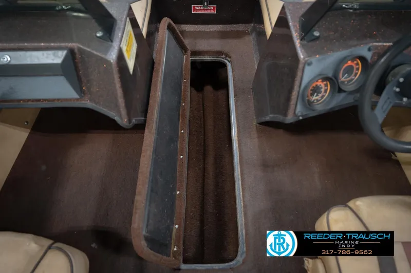 Slide: The Image of 1986 ProCraft 1775 Bass boat interior with dashboard and storage compartment. - 29