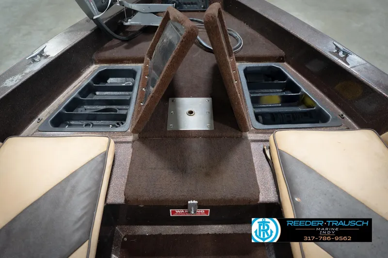 Slide: The Image of 1986 ProCraft 1775 Bass boat interior with storage compartments and seating. - 31