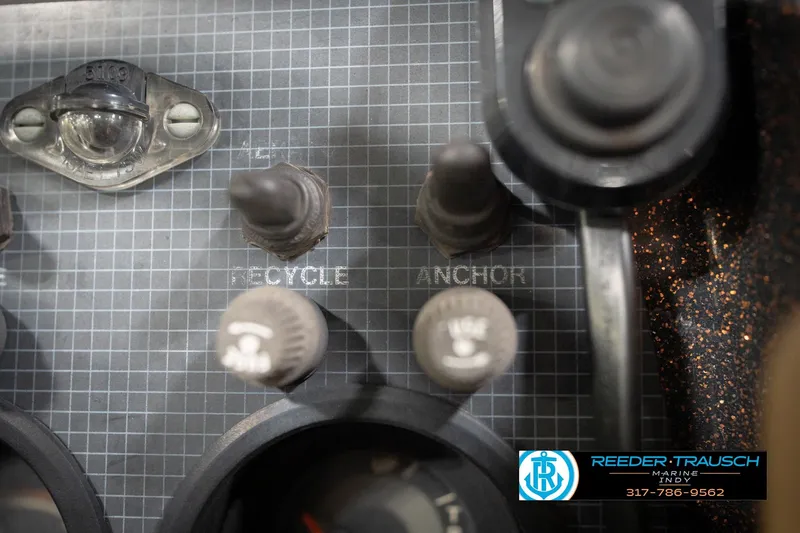 Slide: The Image of Close-up of 1986 ProCraft 1775 Bass boat control panel with switches and dials. - 40