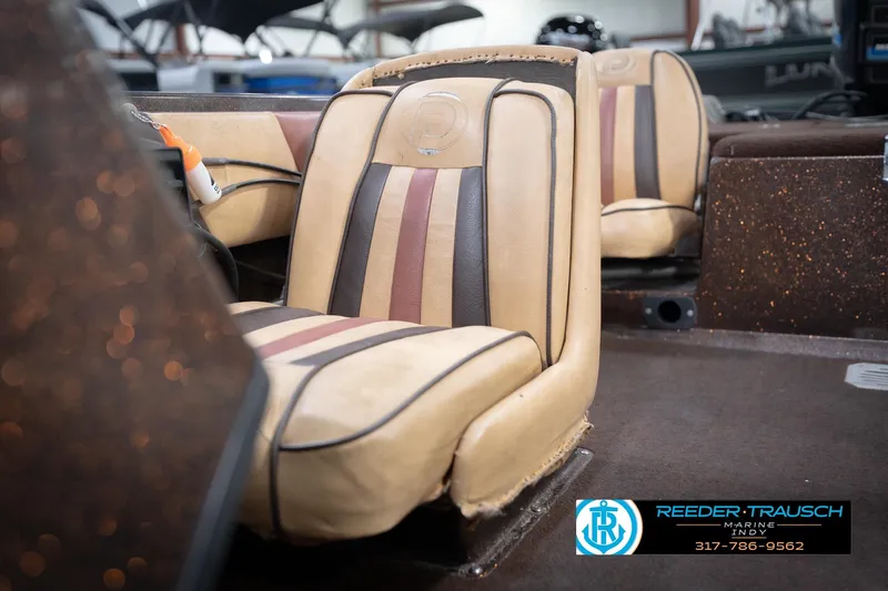 Slide: The Image of 1986 ProCraft 1775 Bass boat interior with tan and brown seats. - 45