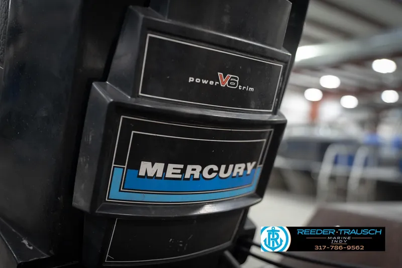 Slide: The Image of Mercury V6 engine on 1986 ProCraft 1775 Bass boat at Reeder-Trausch Marine. - 52