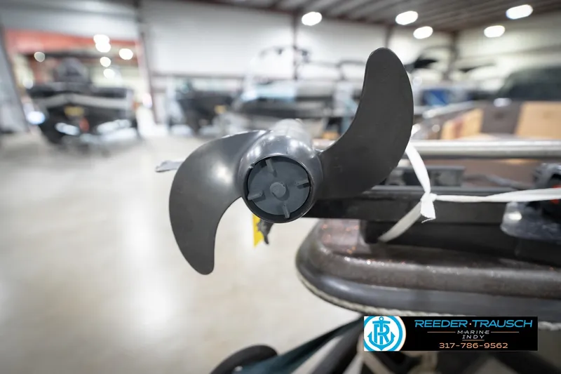 Slide: The Image of Close-up of a 1986 ProCraft 1775 Bass boat propeller in a showroom. - 56