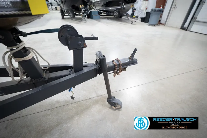 Slide: The Image of Trailer hitch of a 1986 ProCraft 1775 Bass boat in a garage setting. - 59