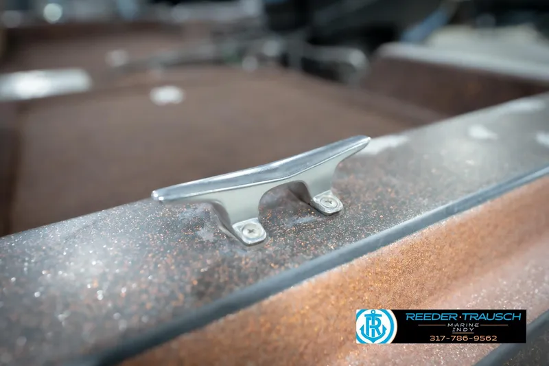 Slide: The Image of 1986 ProCraft 1775 Bass boat cleat detail, Reeder-Trausch Marine logo visible. - 61