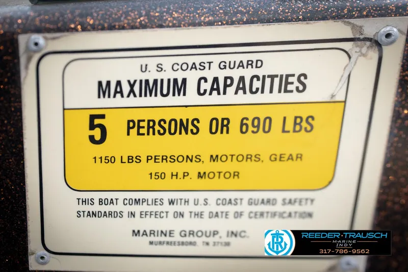 Slide: The Image of 1986 ProCraft 1775 Bass boat capacity label, 5 persons or 690 lbs, 150 HP motor. - 62