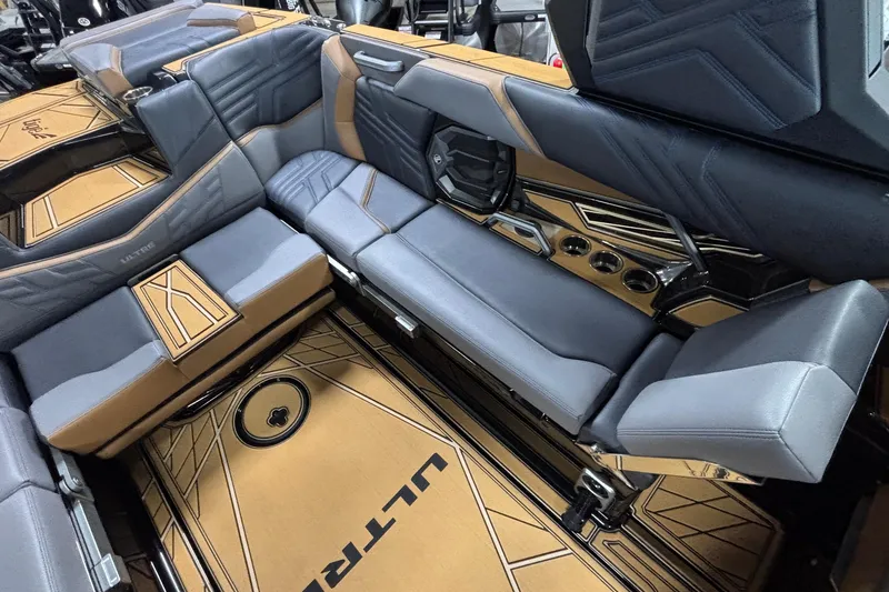 Slide: The Image of Luxurious interior of 2026 Tigé Ultré 25ZX boat with stylish seating and modern design. - 10