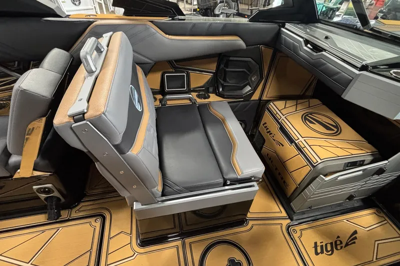 Slide: The Image of 2026 Tigé Ultré 25ZX interior with luxurious seating and stylish design elements. - 11