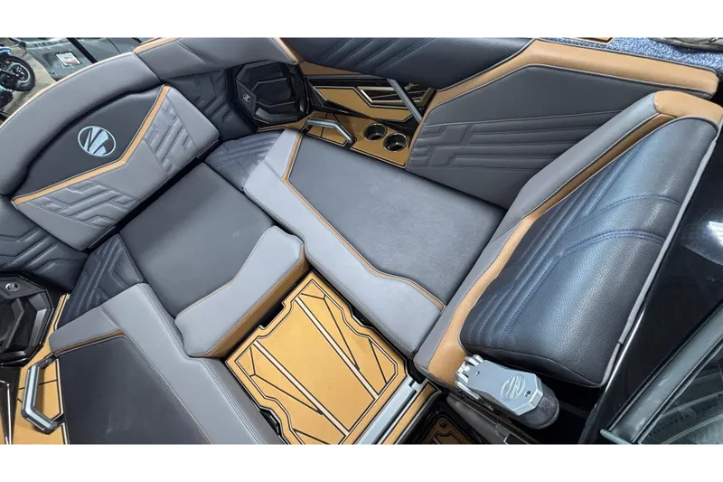 Slide: The Image of 2026 Tigé Ultré 25ZX boat interior with luxurious seating and modern design. - 16