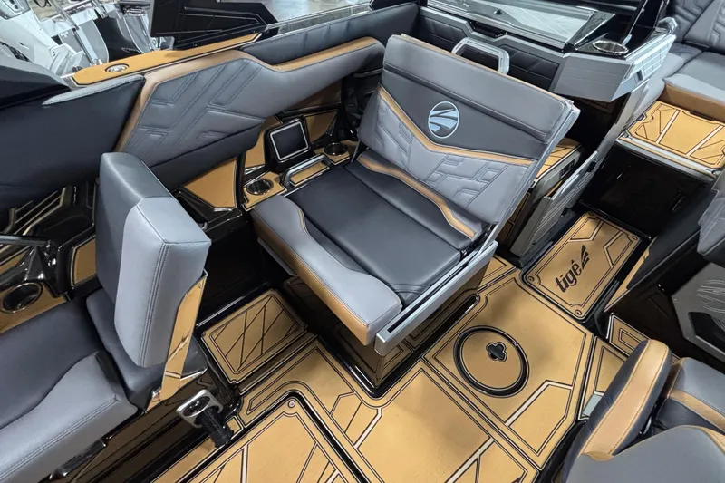 Slide: The Image of Luxurious interior of 2026 Tigé Ultré 25ZX boat with stylish seating and modern design. - 19
