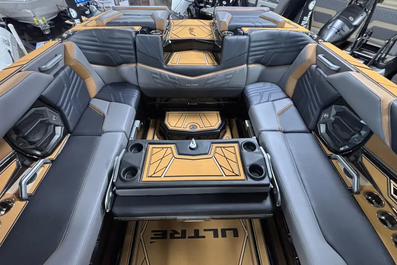 Slide: The Image of Luxurious interior of 2026 Tigé Ultré 25ZX boat with stylish seating and modern design. - 22