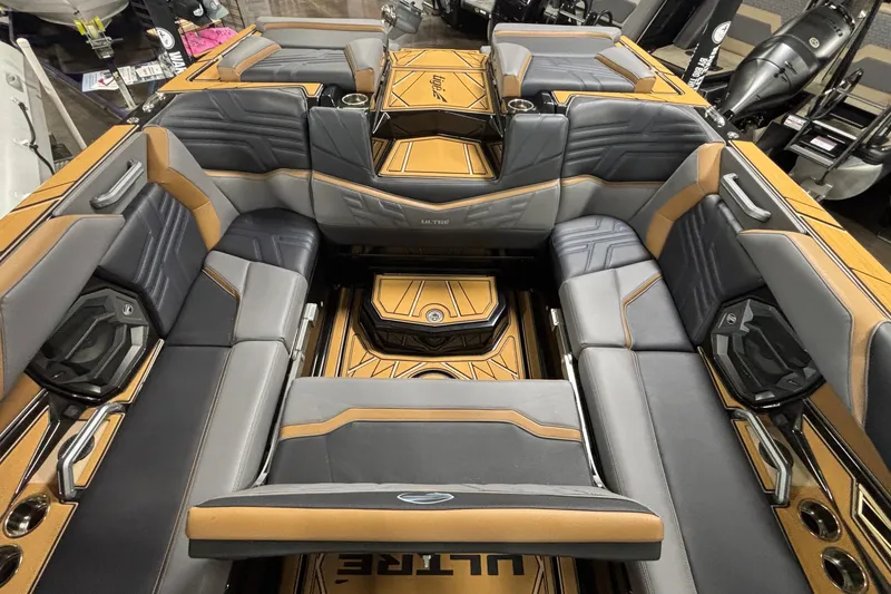 Slide: The Image of 2026 Tigé Ultré 25ZX boat interior with luxurious seating and modern design. - 23