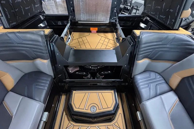Slide: The Image of Interior of 2026 Tigé Ultré 25ZX boat with stylish seating and modern design. - 28