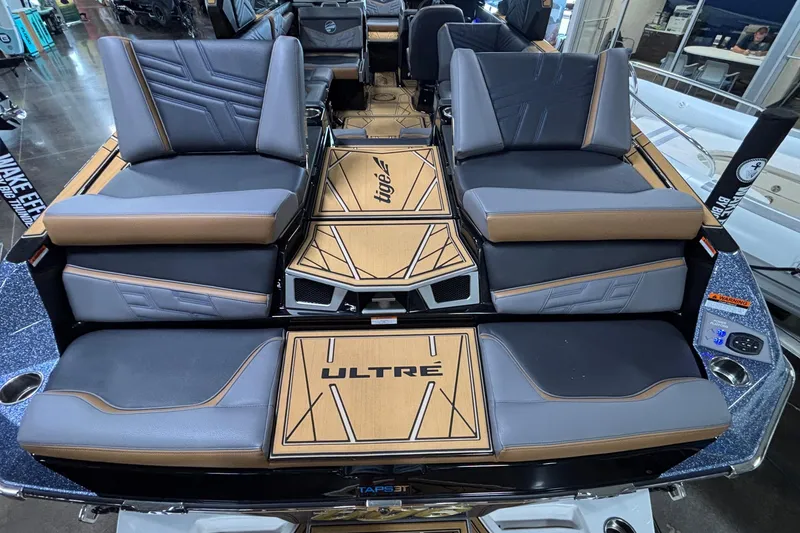Slide: The Image of 2026 Tigé Ultré 25ZX boat interior with luxurious seating and modern design. - 31