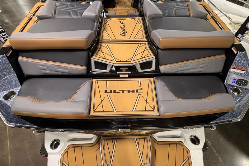 Slide: The Image of 2026 Tigé Ultré 25ZX boat interior with stylish seating and modern design. - 5
