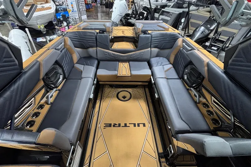 Slide: The Image of 2026 Tigé Ultré 25ZX boat interior with luxurious seating and modern design. - 7