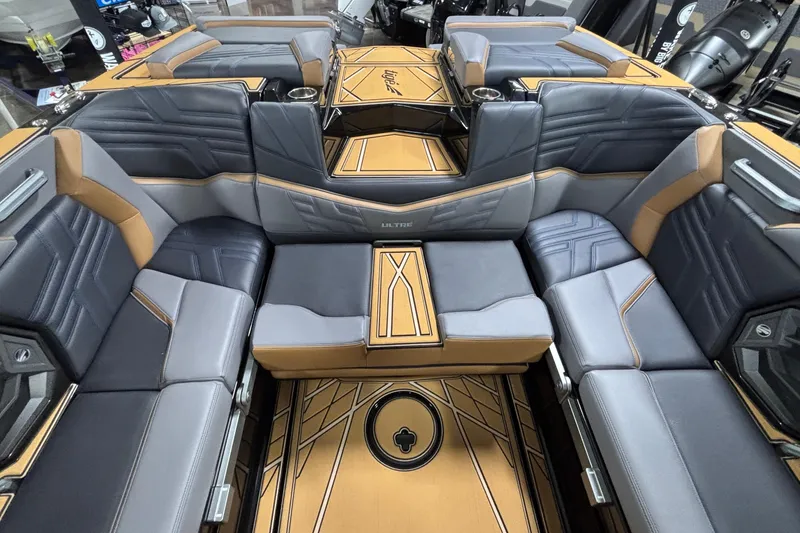 Slide: The Image of 2026 Tigé Ultré 25ZX boat interior with luxurious seating and stylish design. - 9