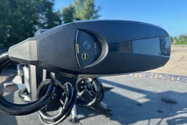 Slide: The Image of Close-up of 2026 Skeeter ZXE21 boat component with control panel and coiled cables. - 5