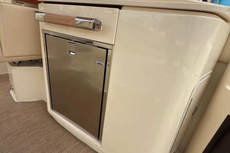 Slide: The Image of 2022 Chris-Craft Launch 35 GT interior with stainless steel mini fridge. - 18