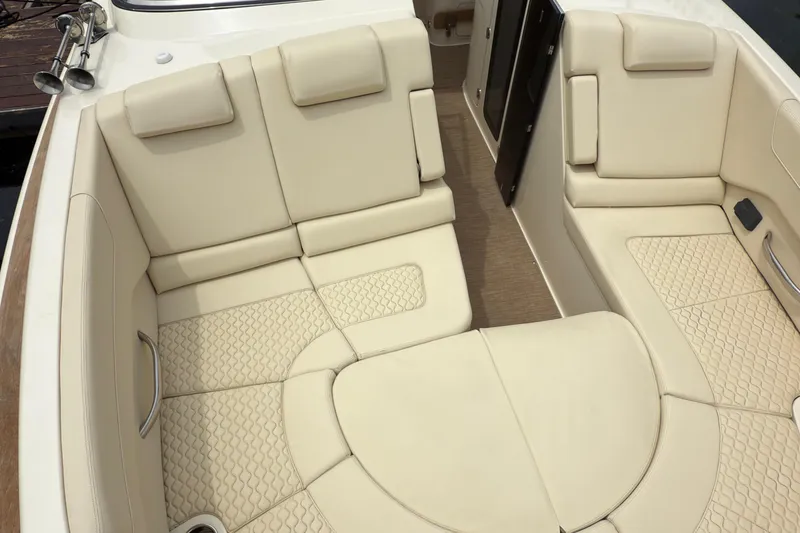 Slide: The Image of Luxurious seating area on 2022 Chris-Craft Launch 35 GT boat, featuring beige upholstery. - 22