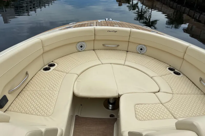 Slide: The Image of Luxurious 2022 Chris-Craft Launch 35 GT boat interior with elegant seating and cup holders. - 25