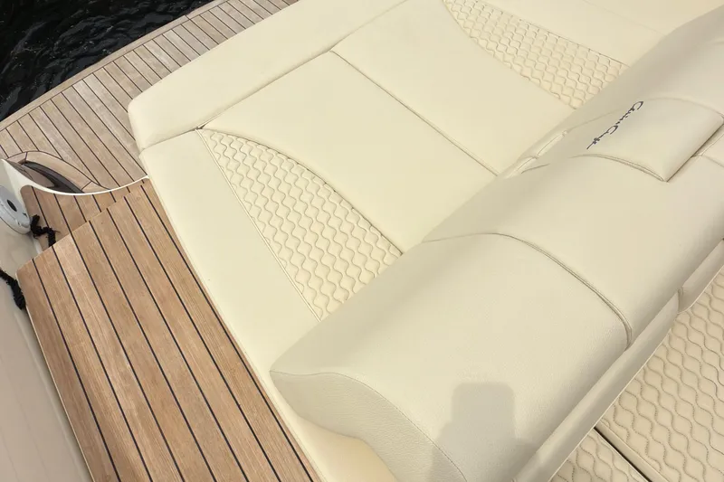 Slide: The Image of Luxurious seating on 2022 Chris-Craft Launch 35 GT boat with elegant wood decking. - 8