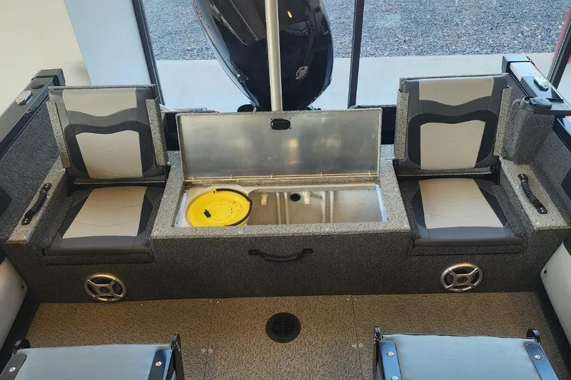 Slide: The Image of 2023 Lowe boat interior with seating and storage compartment, featuring modern design and functionality. - 17