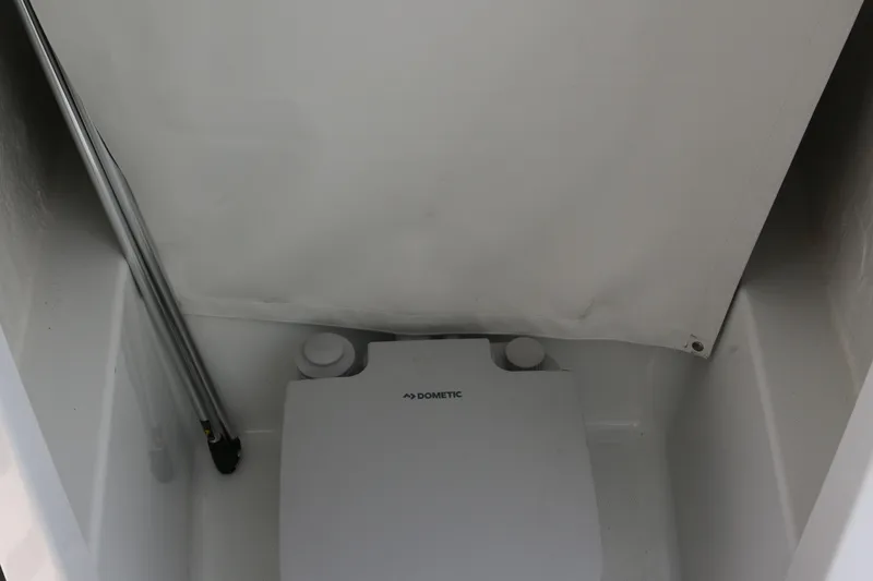 Slide: The Image of Interior of 2026 Wellcraft 202 Fisherman boat with Dometic equipment. - 16