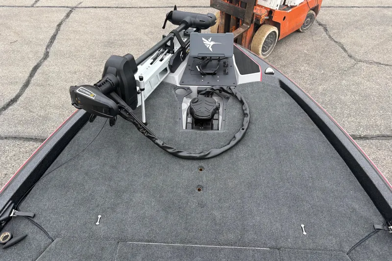 Slide: The Image of 2026 Skeeter ZXE21 boat deck with trolling motor and control panel. - 6