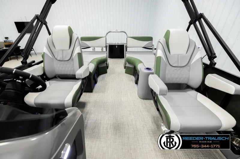Slide: The Image of Interior of 2026 Avalon LSZ QLS boat with modern seating and steering wheel. - 13