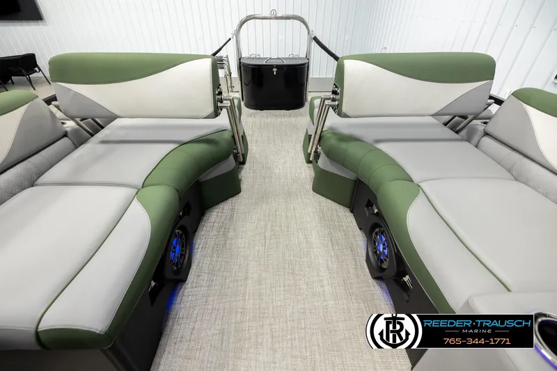 Slide: The Image of 2026 Avalon LSZ QLS boat interior with green and gray seating, modern design. - 14