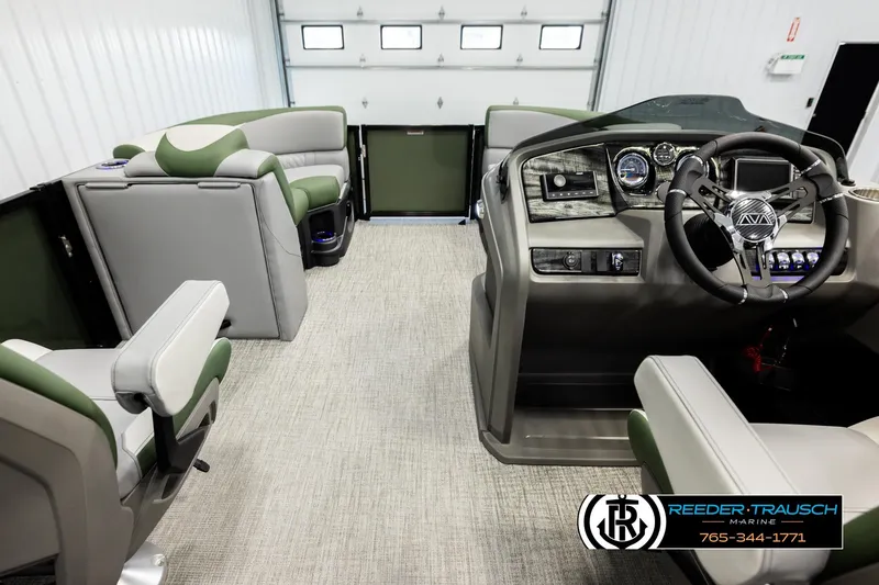Slide: The Image of Interior of 2026 Avalon LSZ QLS boat with modern dashboard and seating. - 18