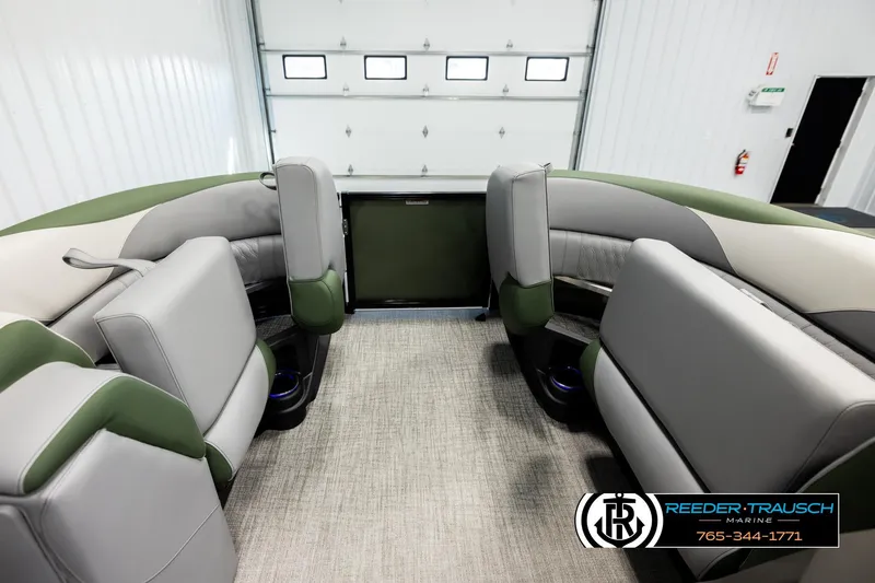 Slide: The Image of 2026 Avalon LSZ QLS boat interior with green and gray seating, spacious layout. - 20