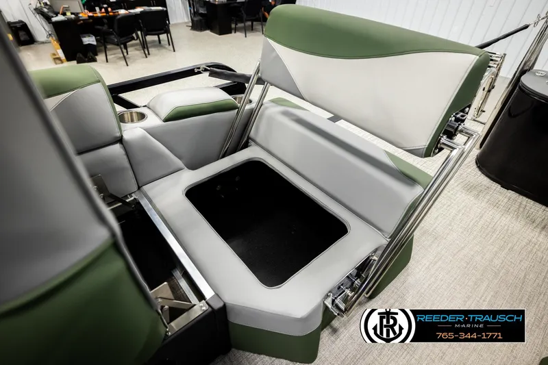 Slide: The Image of 2026 Avalon LSZ QLS boat seat with storage compartment, green and gray upholstery. - 22