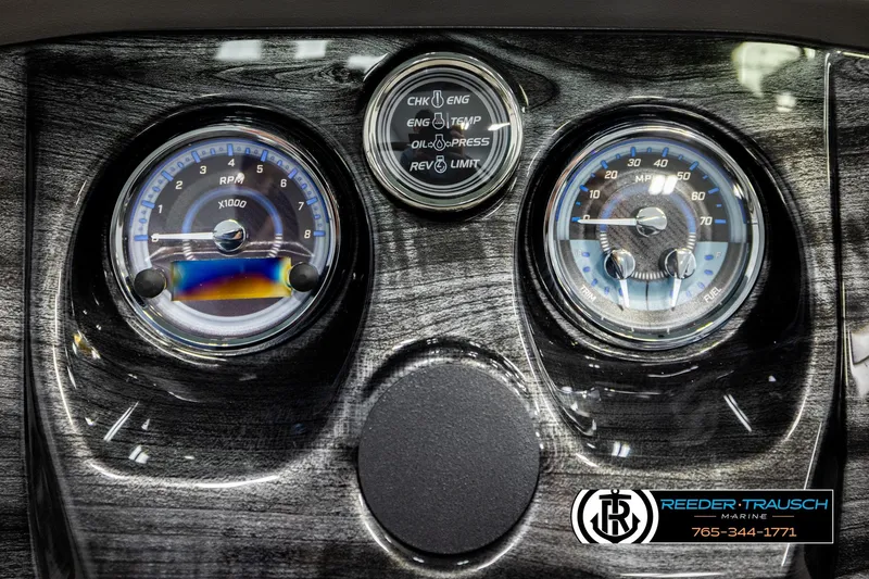 Slide: The Image of Dashboard of 2026 Avalon LSZ QLS with RPM and speed gauges, Reeder-Trausch Marine branding. - 30