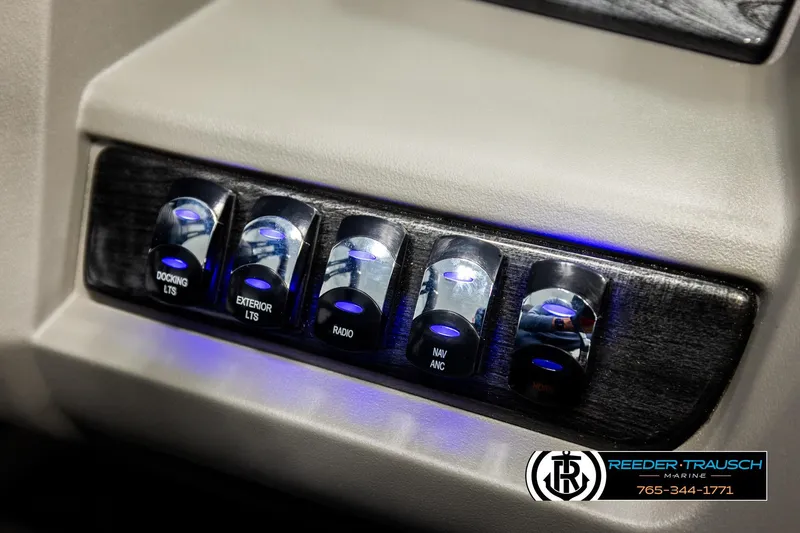 Slide: The Image of Control panel of 2026 Avalon LSZ QLS boat with illuminated switches. - 33