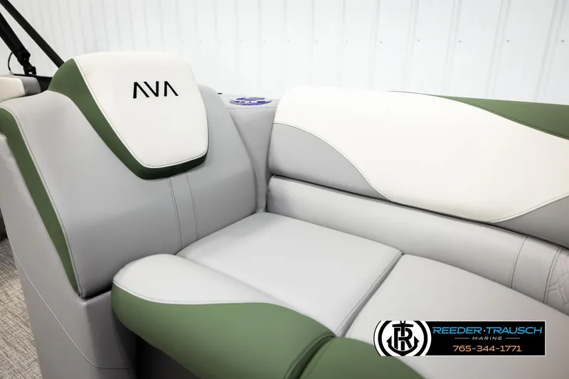 Slide: The Image of 2026 Avalon LSZ QLS boat interior with green and white seating, Reeder-Trausch Marine logo. - 40